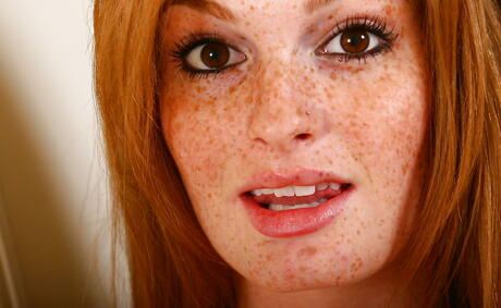 Rangy red-haired youthful Faye Valentine in lingerie baring big knockers and masturbating 