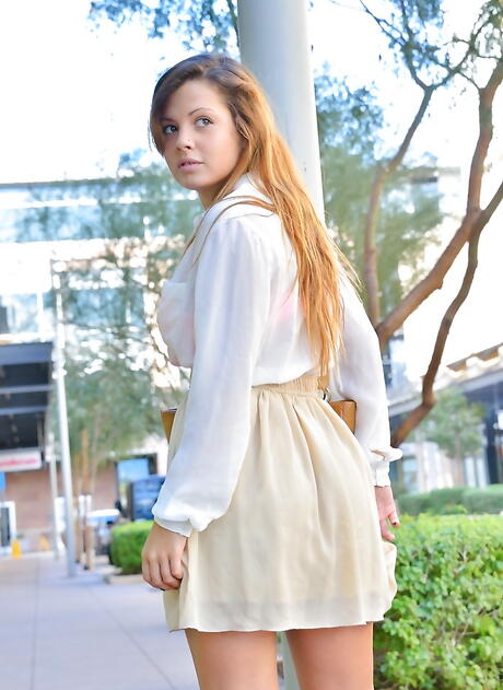 Svelte american red-haired youthful Keisha Grey revealing big titties and spreading her legs outdoor